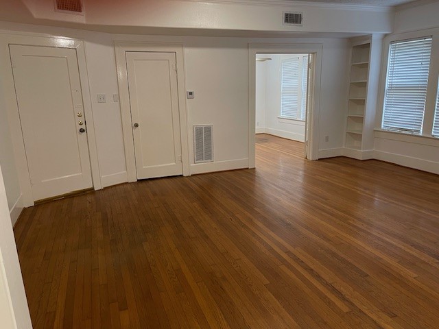 1661 Kipling Street, Unit 2 Houston, TX 77006 - Photo 2 of 10 a view of an empty room and wooden floor