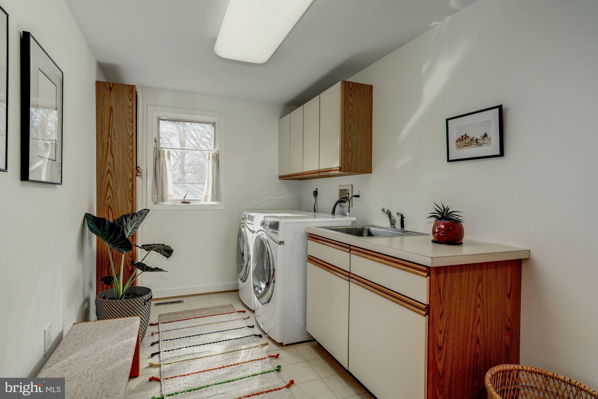 6607 Persimmon Tree Road Cabin John, MD 20818 - Photo 21 of 42 Main Level Laundry Room