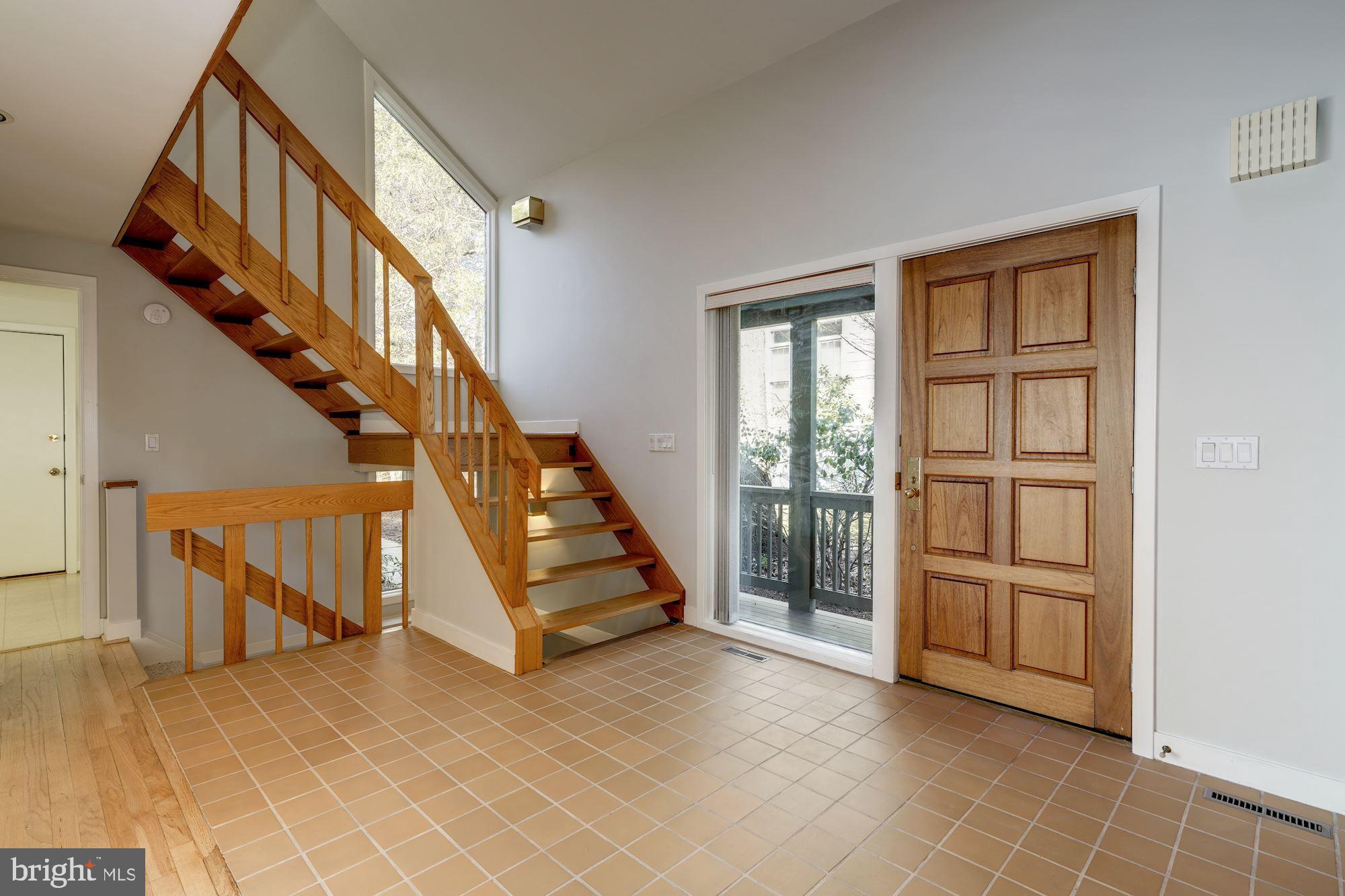 6607 Persimmon Tree Road Cabin John, MD 20818 - Photo 5 of 42 Bright and Open 2 Story Foyer