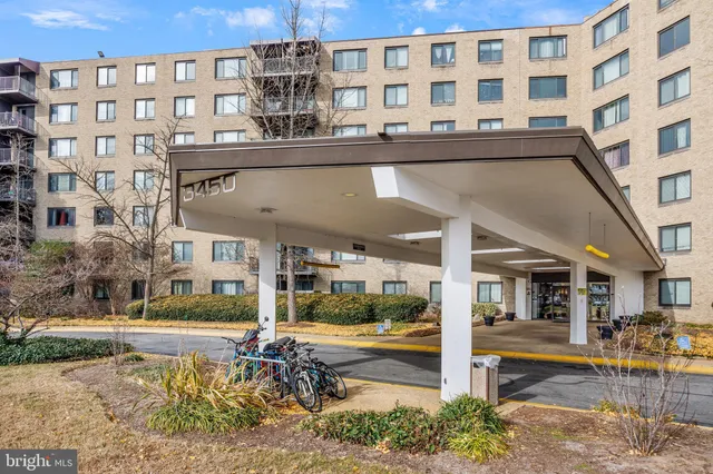 a front view of a building with street view