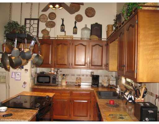 199 Burrell Hill Road Penn, PA 15675 - Photo 3 of 16 Kitchen. Pot rack is also included with this sale.