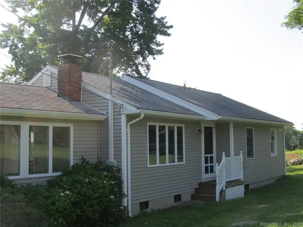 a house view with a garden space