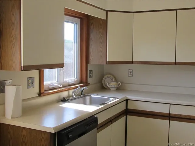 a kitchen with a sink and a cabinets