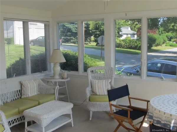 a living room with a couch and a table