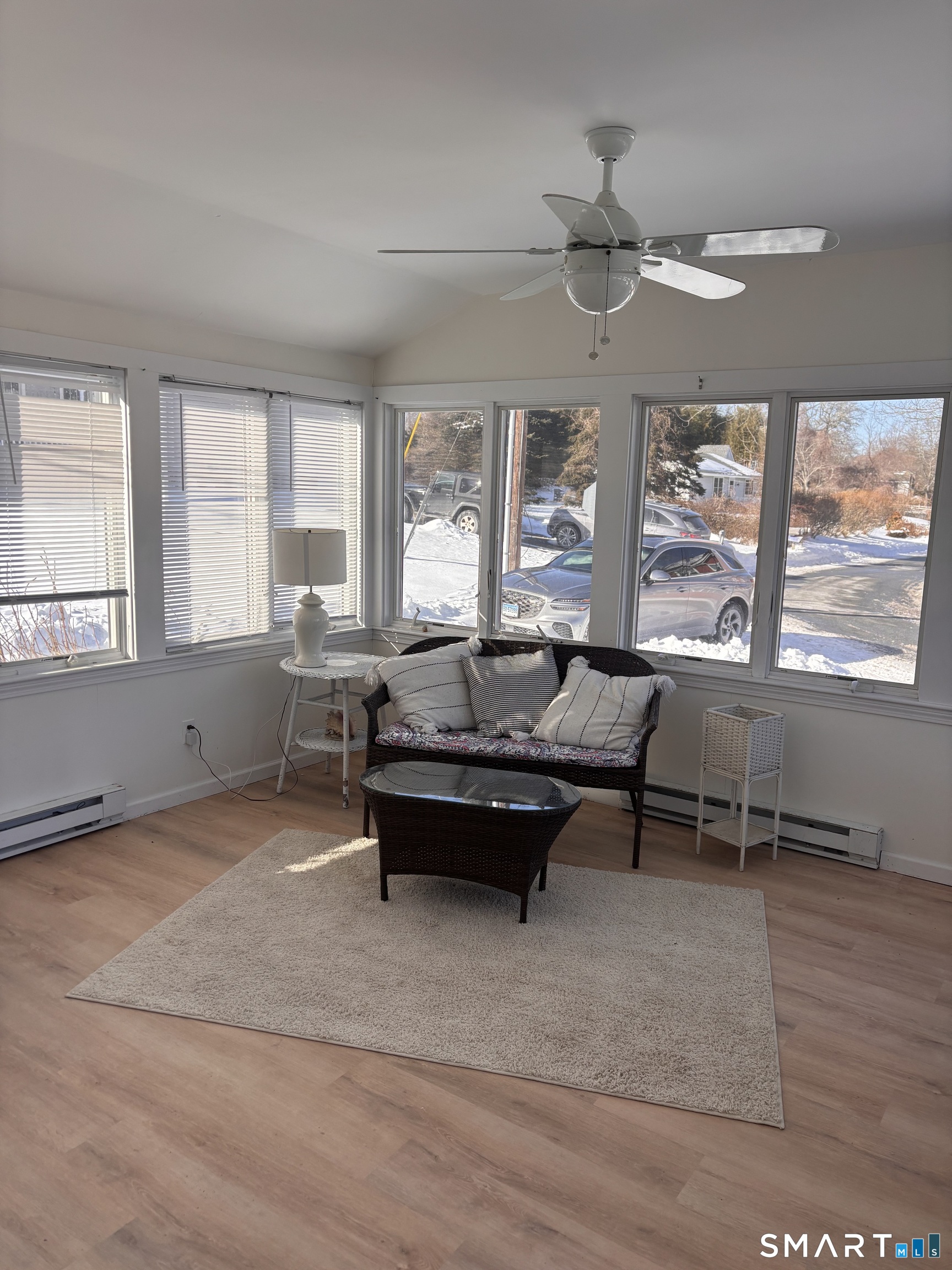 34 Brightwater Road East Lyme, CT 06357 - Photo 10 of 19 a living room with furniture and a large window