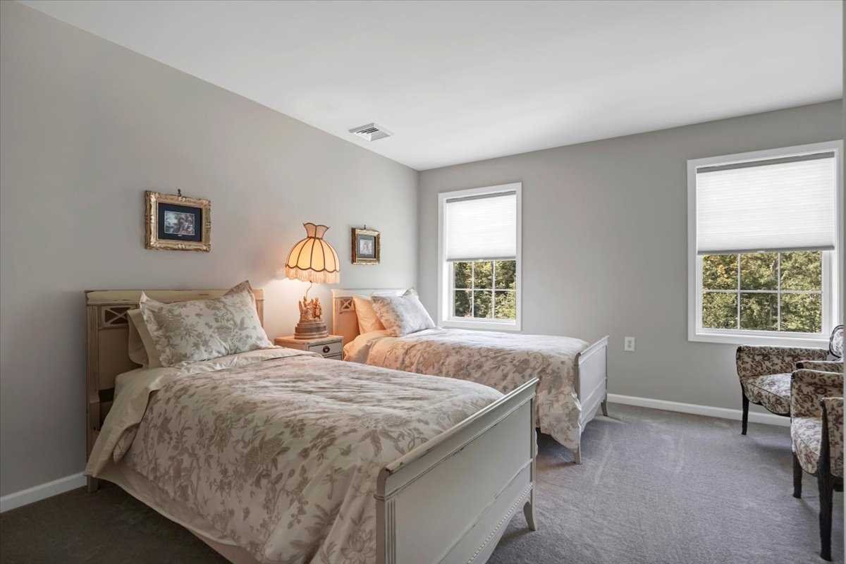 119 Ridge Road Clinton Corners, NY 12514 - Photo 23 of 31 a bedroom with a large bed and a desk