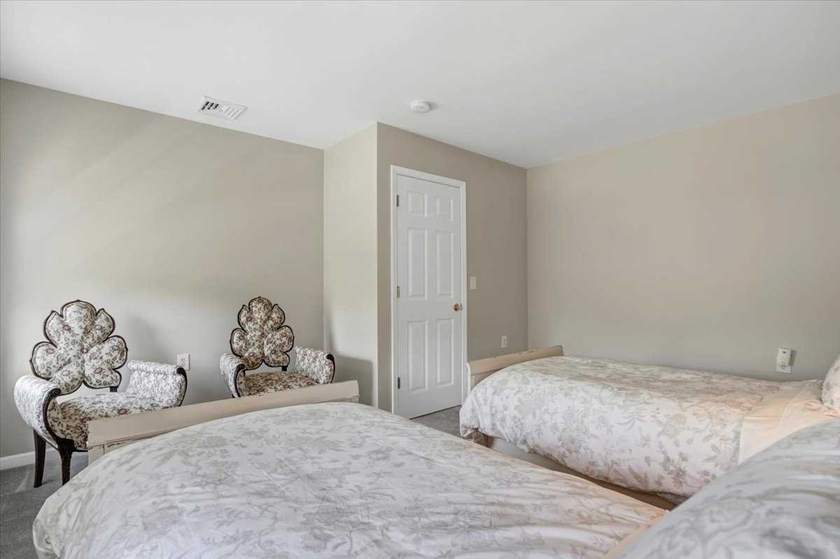 119 Ridge Road Clinton Corners, NY 12514 - Photo 24 of 31 a bedroom with a bed and a window