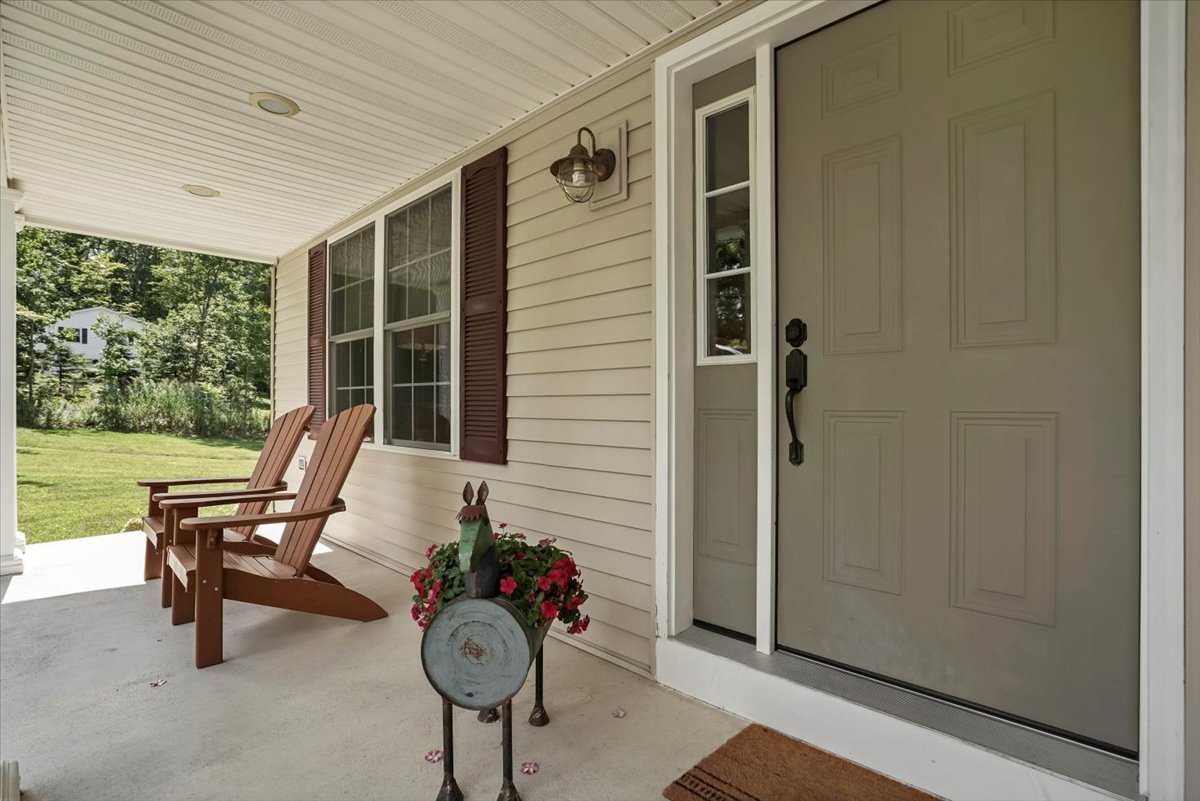 119 Ridge Road Clinton Corners, NY 12514 - Photo 4 of 31 a view of a patio with a table and chairs