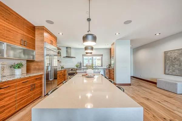 a bedroom with furniture and a fireplace