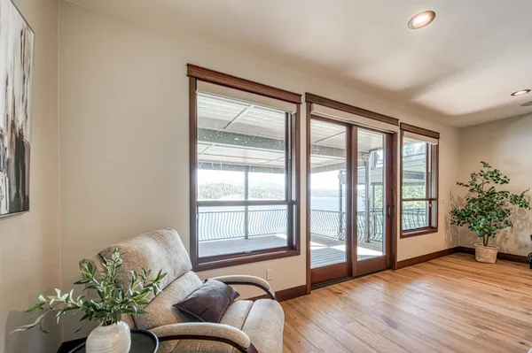 a spacious bedroom with a bed and a couch