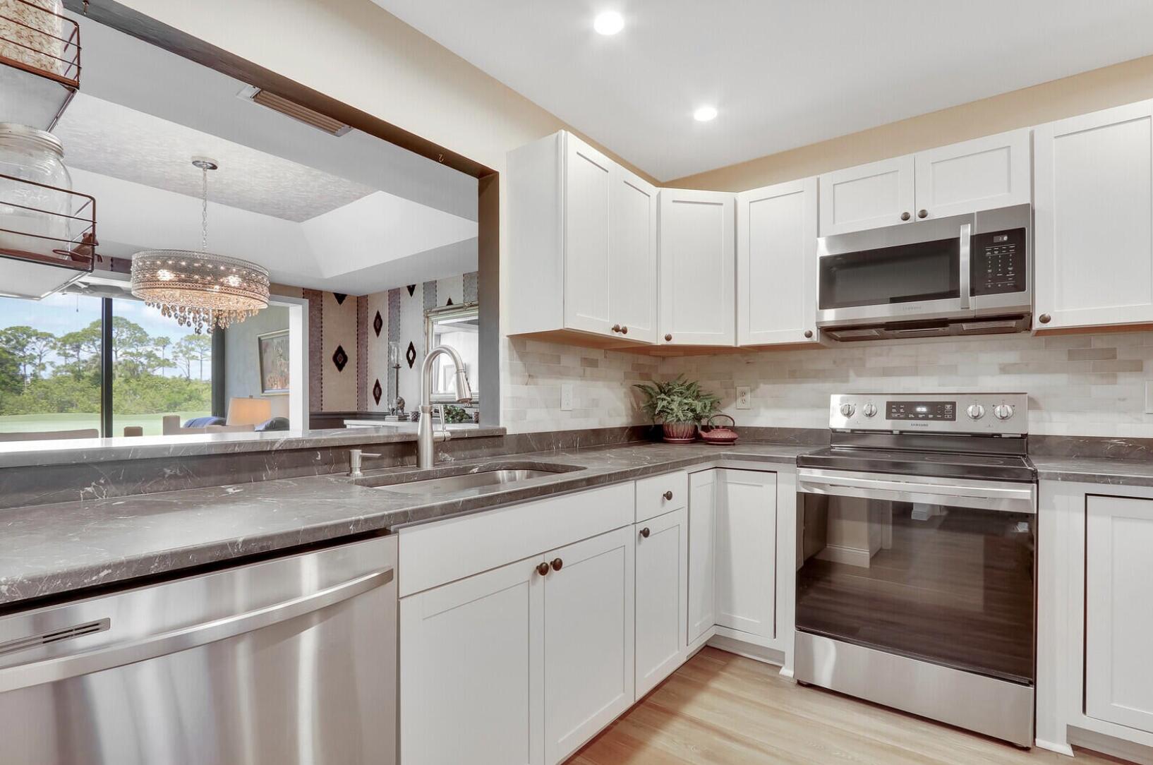 5661 Southeast Foxcross Place Stuart, FL 34997 - Photo 24 of 62 Kitchen 1