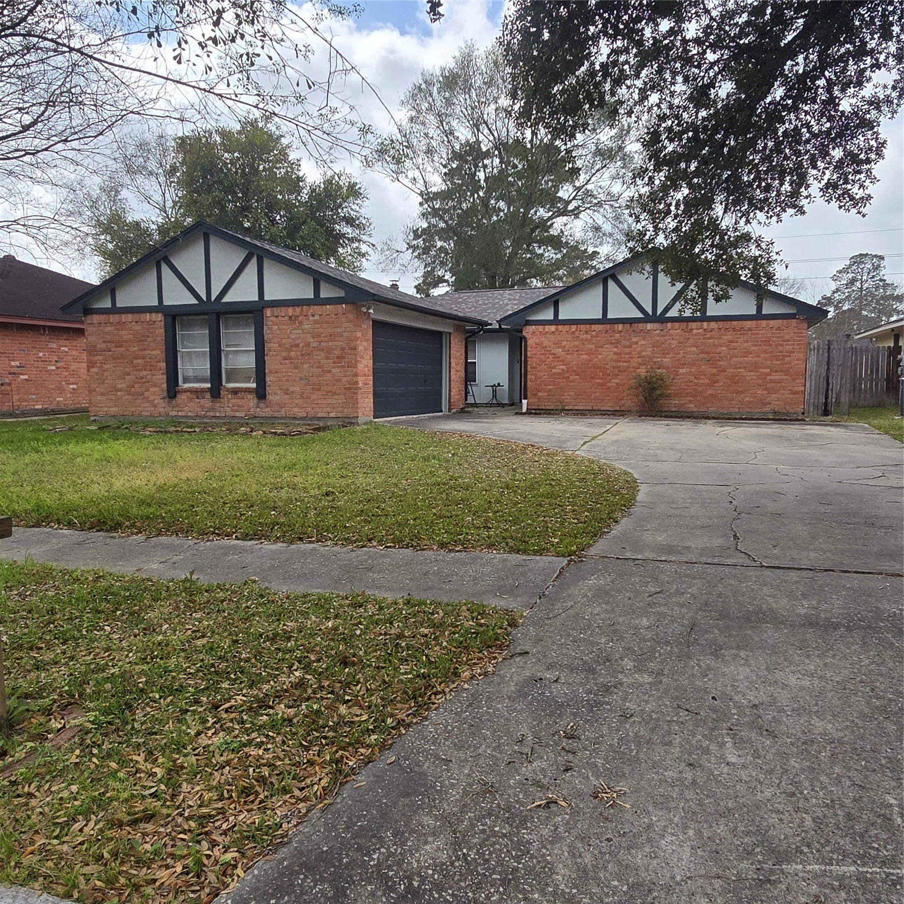 22527 Millgate Drive Spring, TX 77373 - Photo 1 of 30 a view of backyard of house with wooden fence