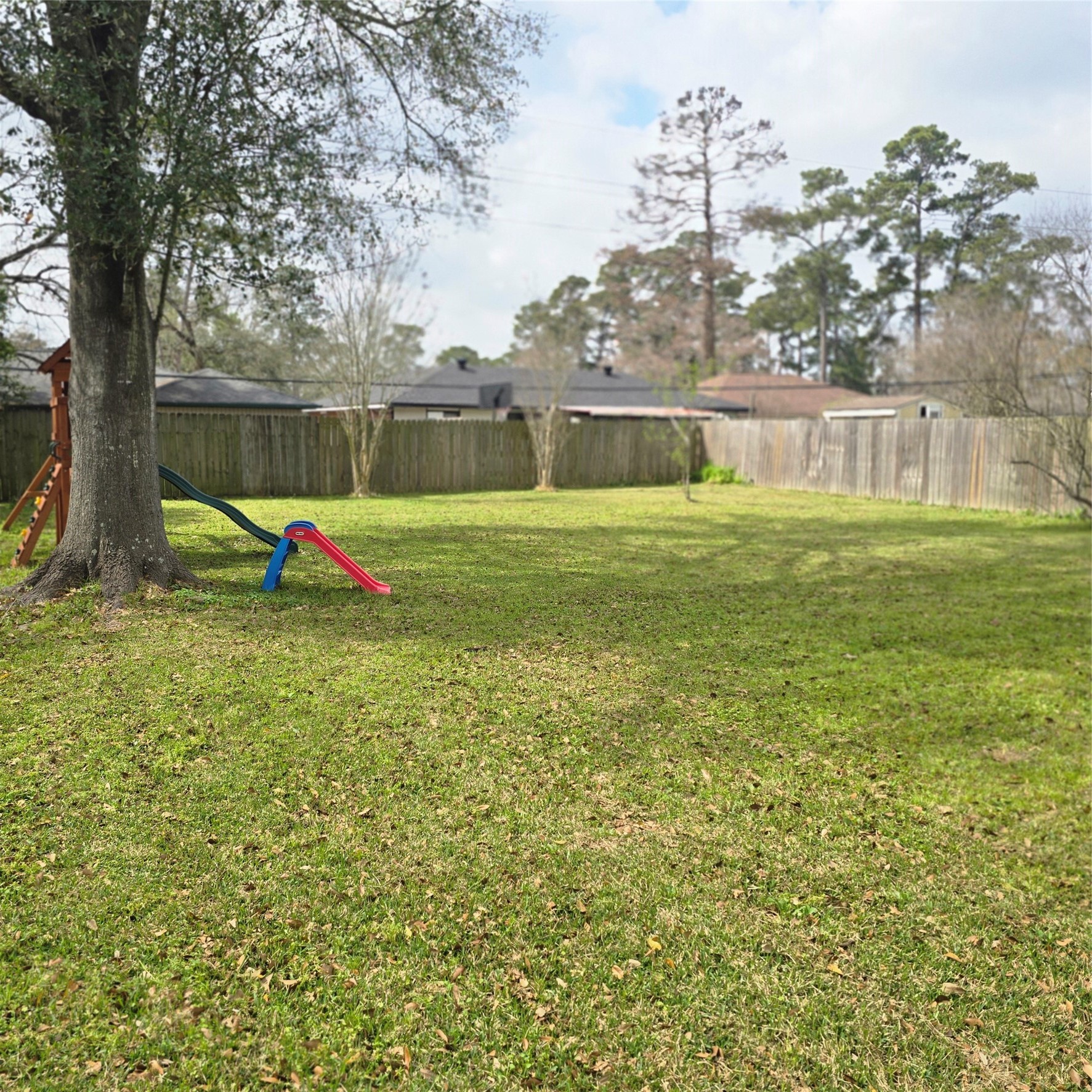 22527 Millgate Drive Spring, TX 77373 - Photo 26 of 30 a view of outdoor space with playground and green space