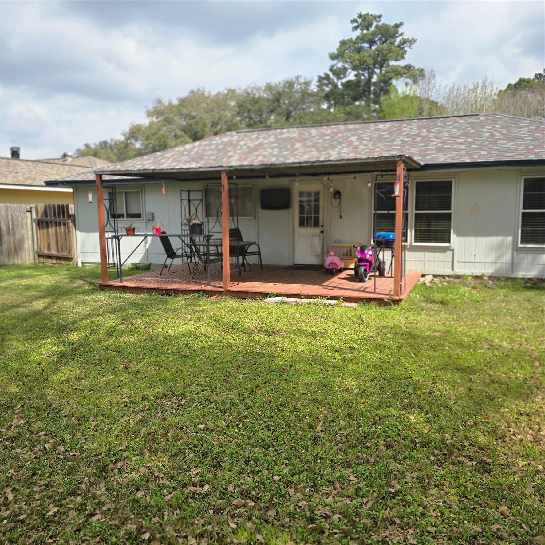 22527 Millgate Drive Spring, TX 77373 - Photo 27 of 30 a front view of a house with patio outdoor seating