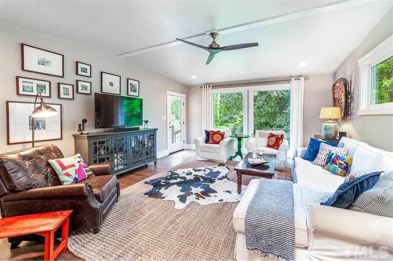 2251 Cranford Road Durham, NC 27705 - Photo 11 of 30 The oversized windows in the Family Room create a perfect retreat for relaxing and taking in your views of the large backyard. You are also able to access the back deck and fenced backyard from this room.
