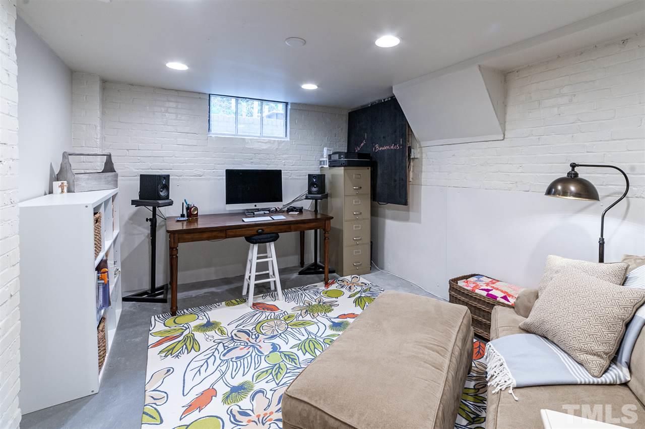 2251 Cranford Road Durham, NC 27705 - Photo 24 of 30 Use this finished basement space as an office, for jam sessions, gaming, brewing and/or crafting.