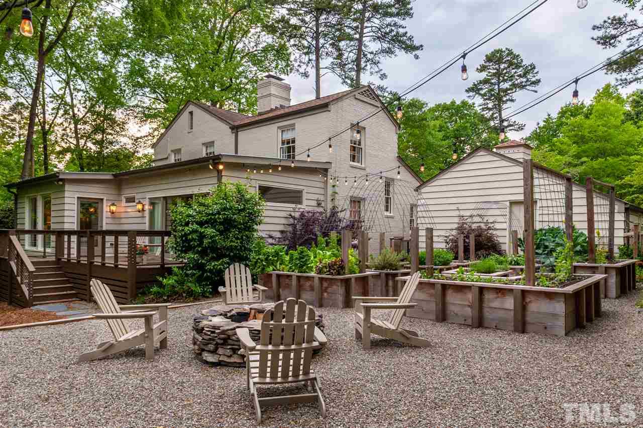 2251 Cranford Road Durham, NC 27705 - Photo 26 of 30 This fenced backyard sanctuary includes a stunning large raised garden bed design with arching trellises and irrigation system, fire pit and deck.