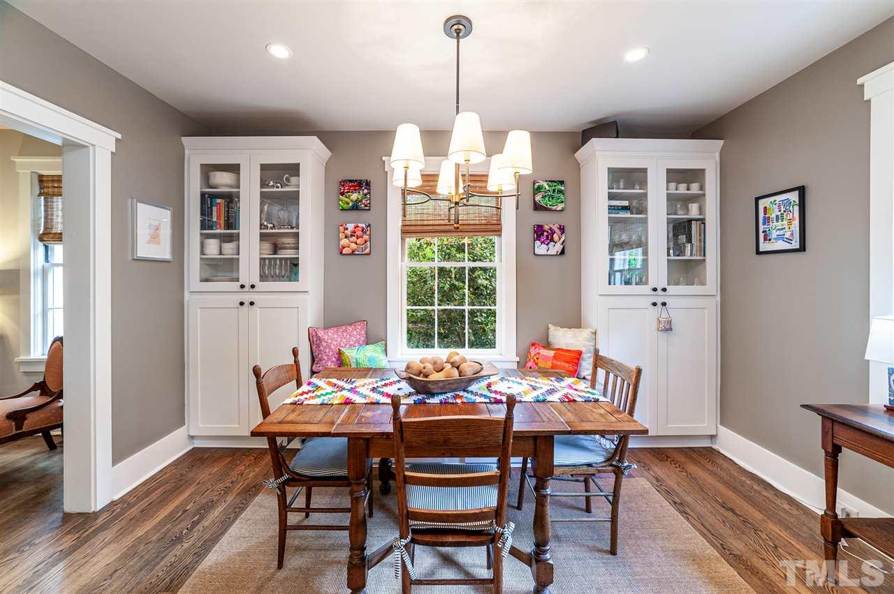 2251 Cranford Road Durham, NC 27705 - Photo 6 of 30 Get comfortable in this charming Breakfast Nook with banquet seating, large picturesque windows and built-in Craftsman hutches to display china, vintage glassware or tuck away children's craft supplies.