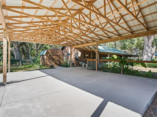 a view of garage with a tv