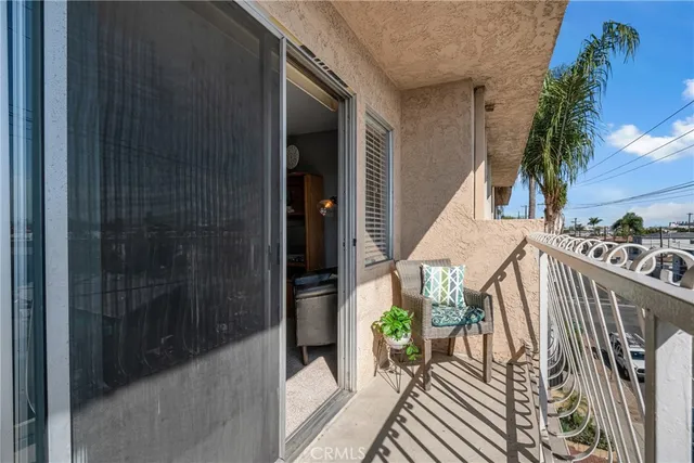a balcony with furniture