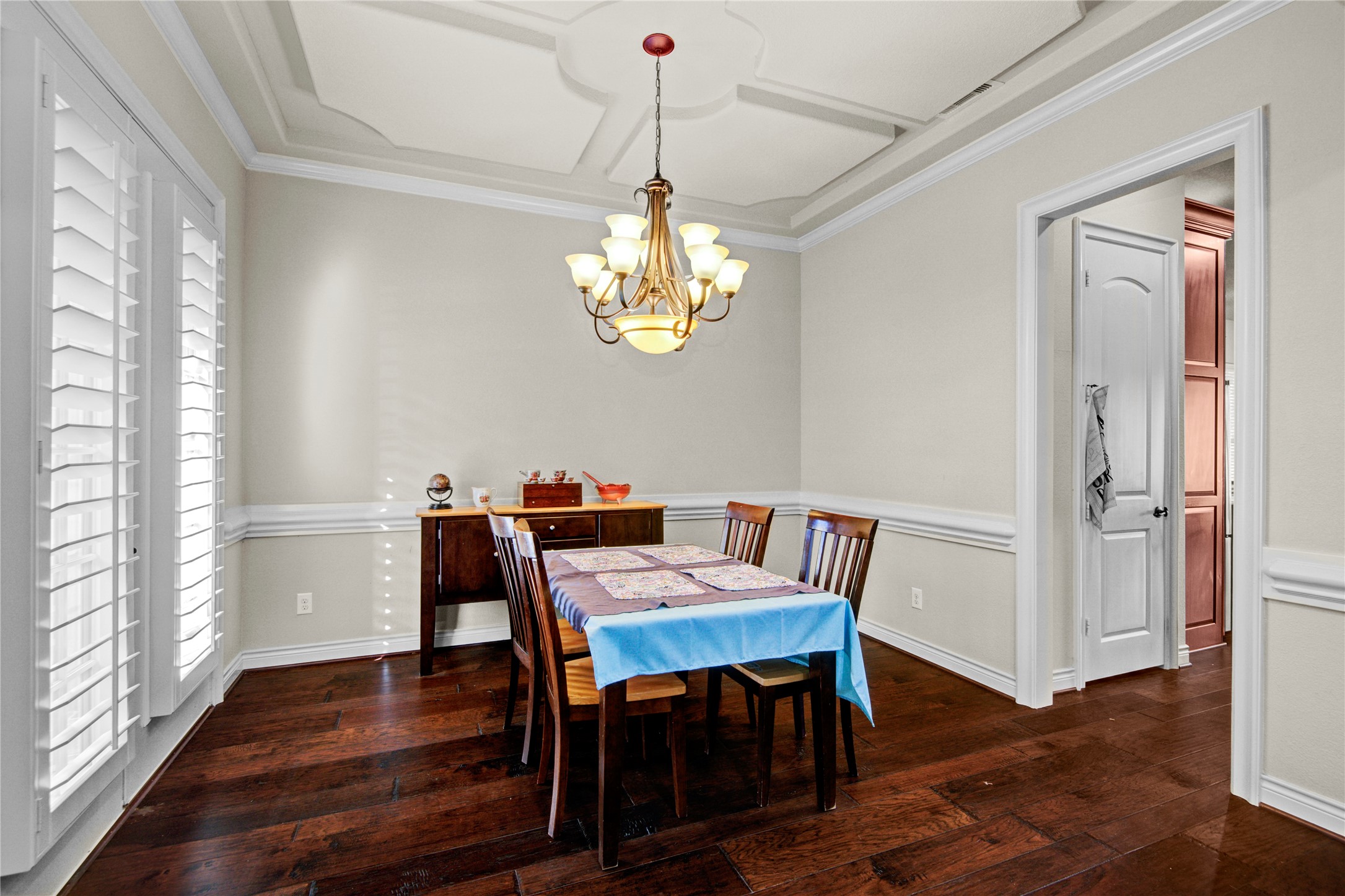 4315 Sanctuary Halls Spring, TX 77388 - Photo 42 of 50 a view of a dining room with furniture a chandelier and wooden floor