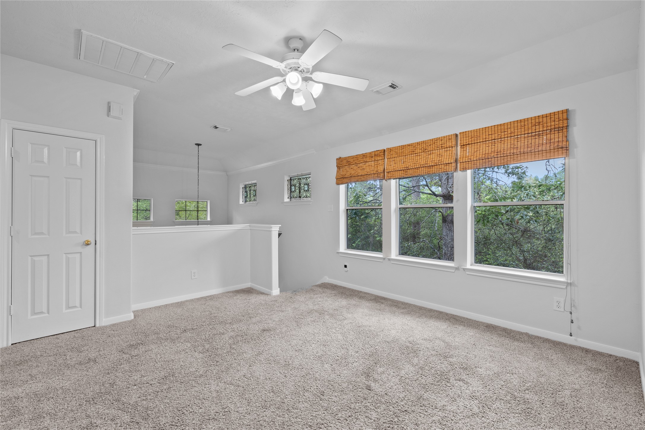 107 West Burberry Circle The Woodlands, TX 77384 - Photo 11 of 28 a view of an empty room with a window