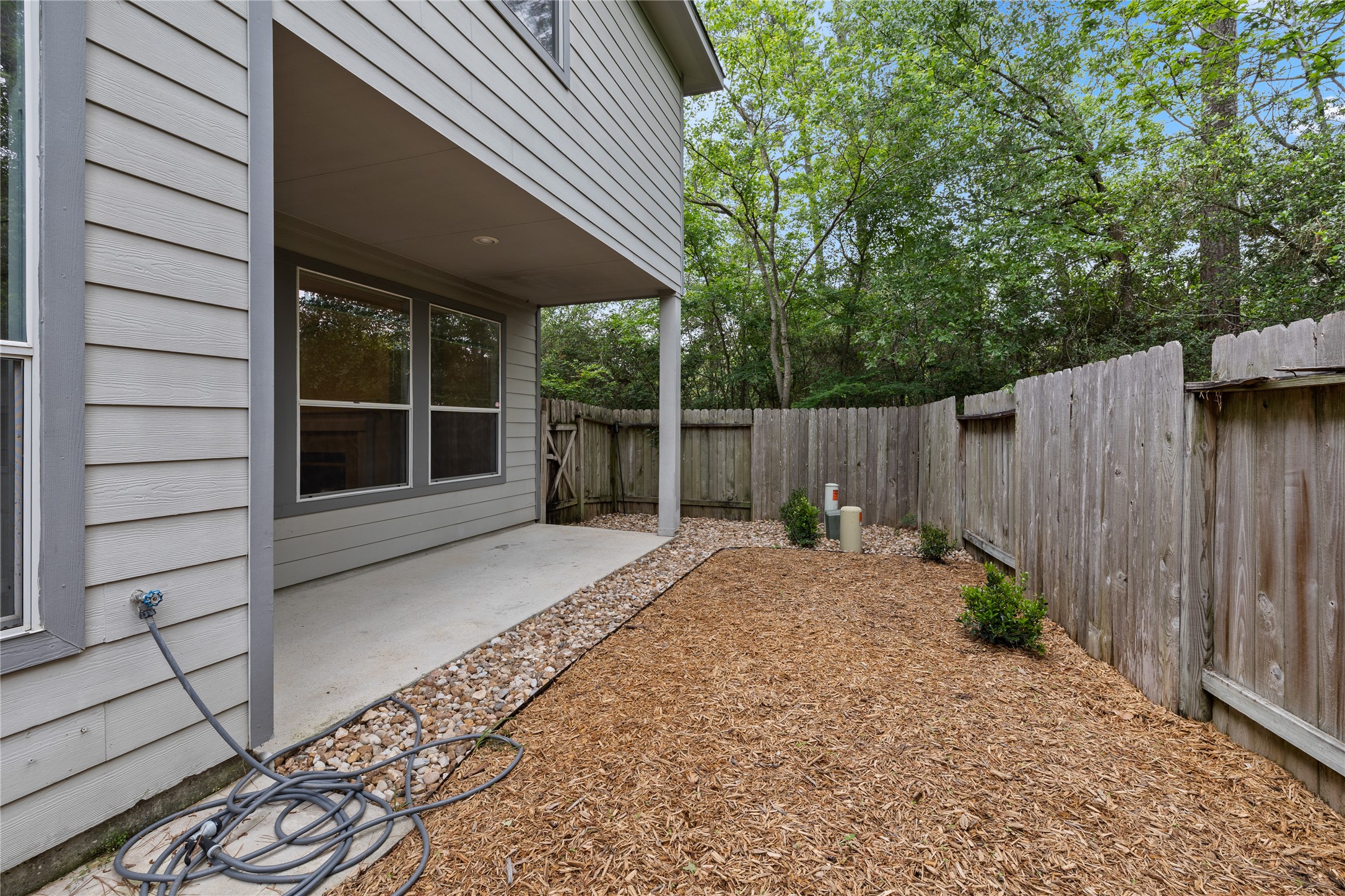 107 West Burberry Circle The Woodlands, TX 77384 - Photo 26 of 28 a view of a backyard