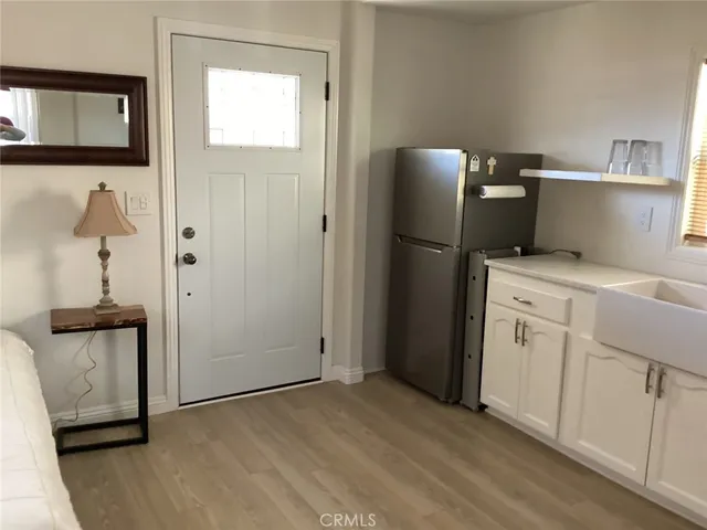 a view of cabinets with wooden floor and cabinet