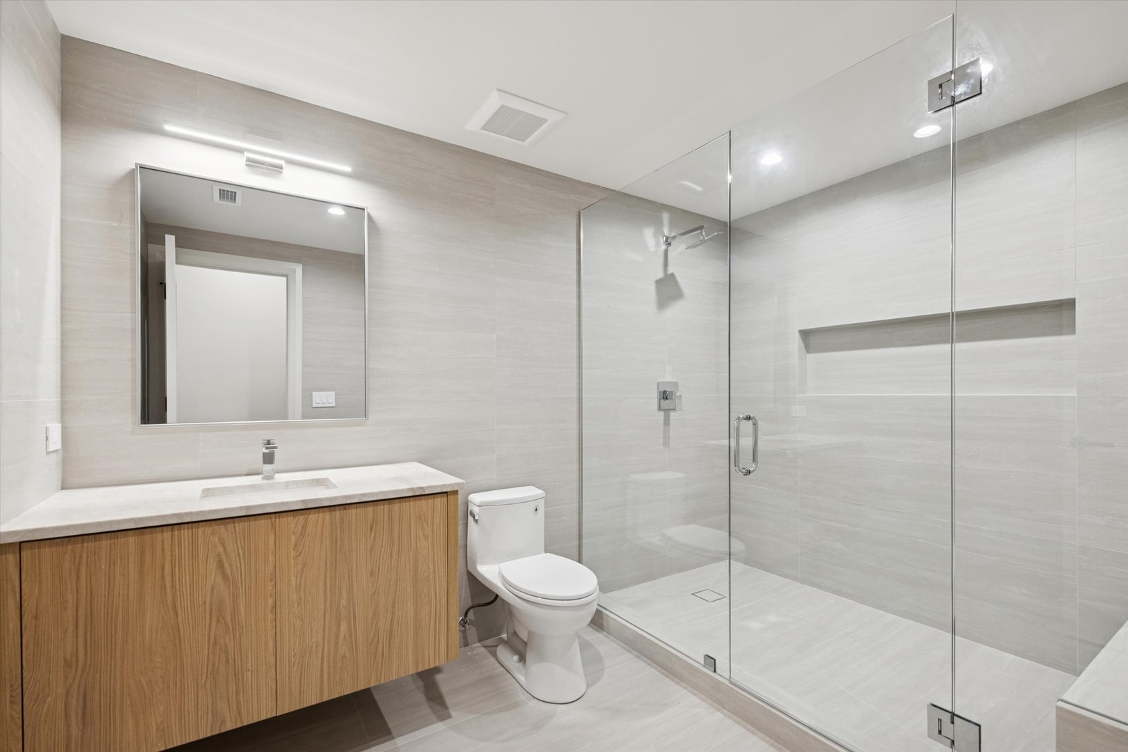 377 Prairie Avenue Elmhurst, IL 60126 - Photo 51 of 64 a bathroom with a toilet sink and shower