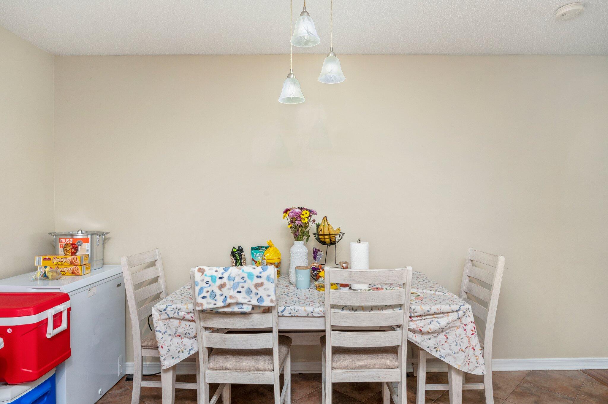 384 John King Road Crestview, FL 32539 - Photo 14 of 19 a view of a dining room with furniture and chandelier
