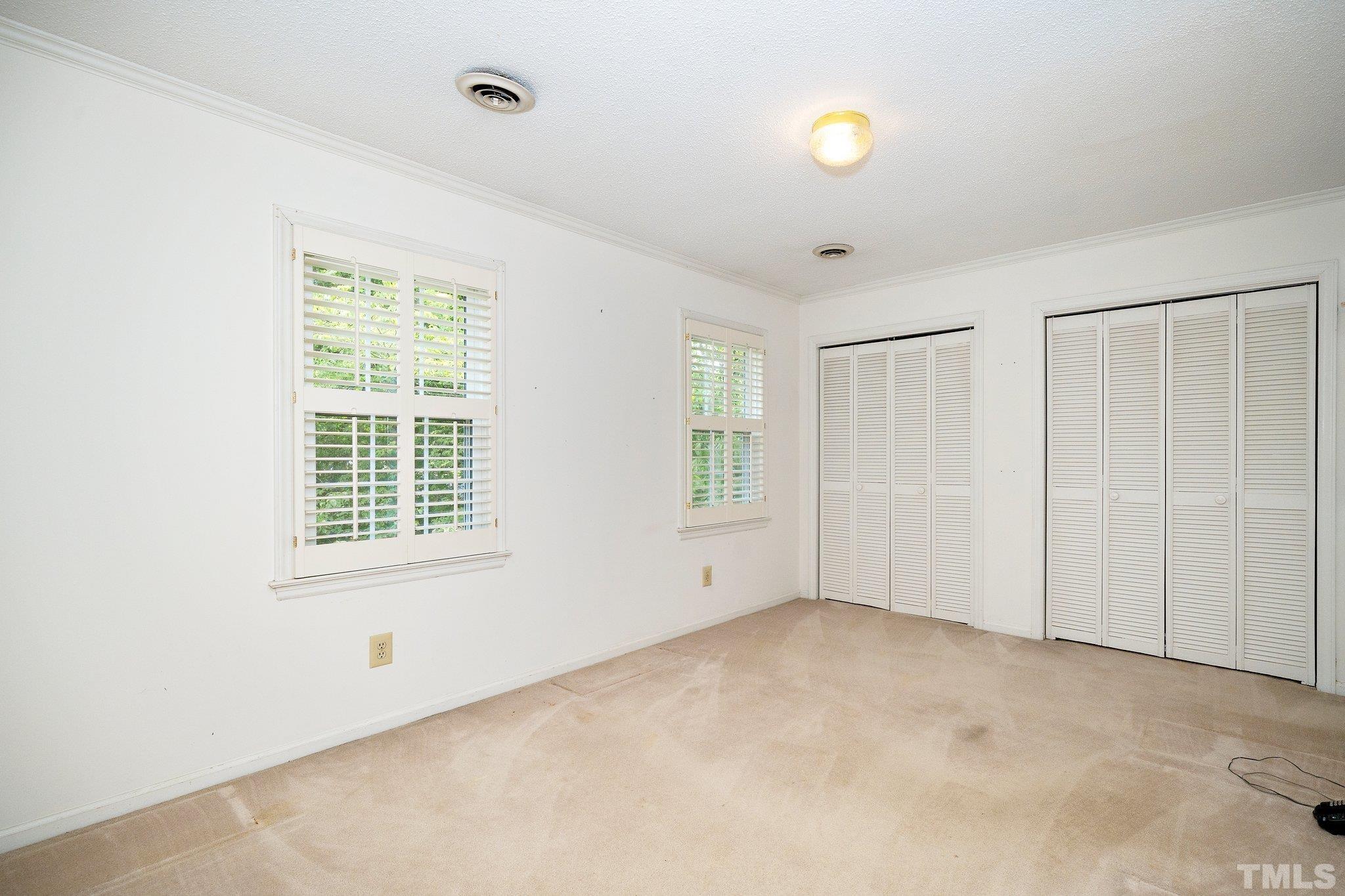 1512 Pony Run Road Raleigh, NC 27615 - Photo 25 of 39 a view of an empty room with a window