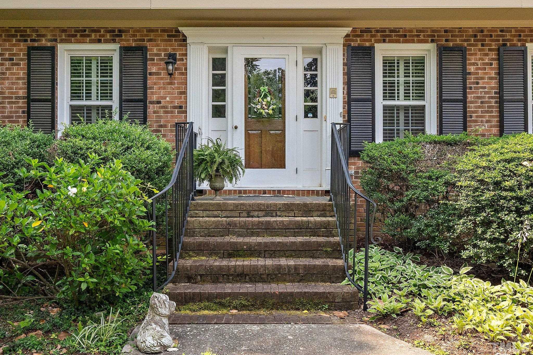 1512 Pony Run Road Raleigh, NC 27615 - Photo 7 of 39 a view of a house with potted plants