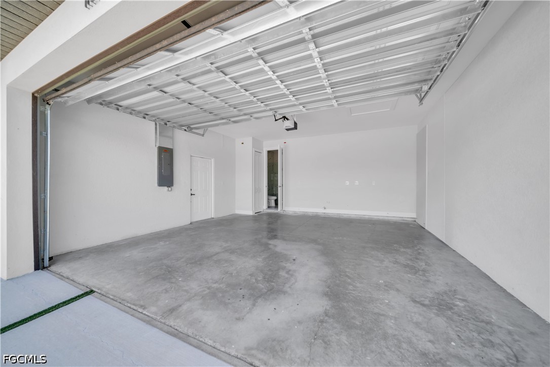 1128 Nelson Road North Cape Coral, FL 33993 - Photo 17 of 22 a view of a hallway