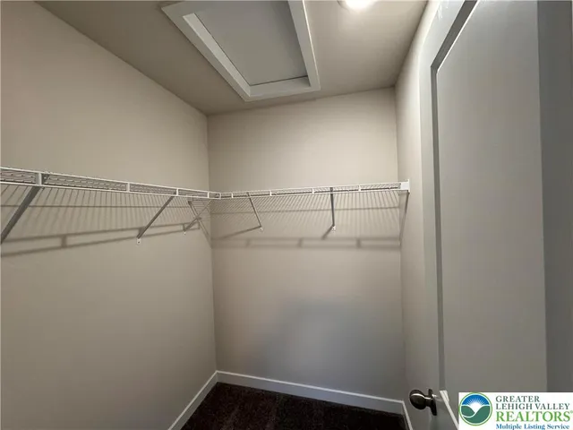 a view of a room with racks on the wall