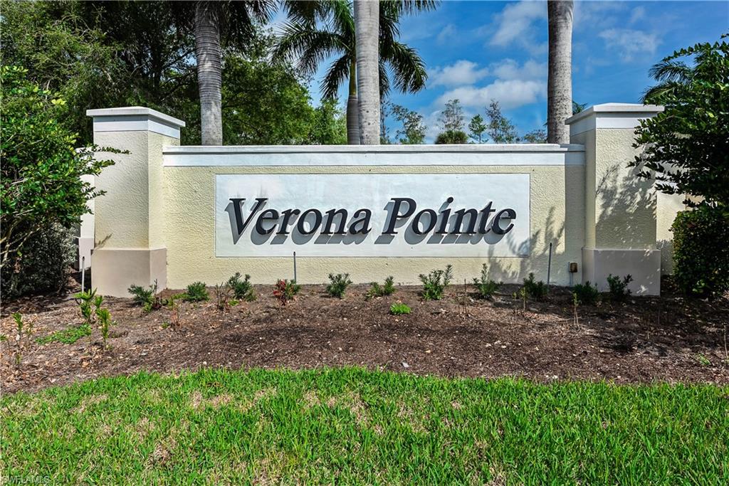 16211 Ravina Way, Unit 18 Naples, FL 34110 - Photo 1 of 24 a sign broad in front of a building