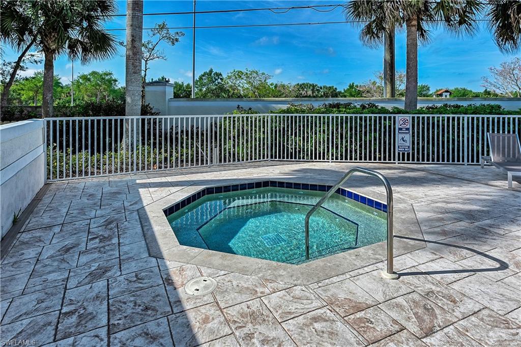 16211 Ravina Way, Unit 18 Naples, FL 34110 - Photo 24 of 24 a view of a wooden deck with couches and wooden floor