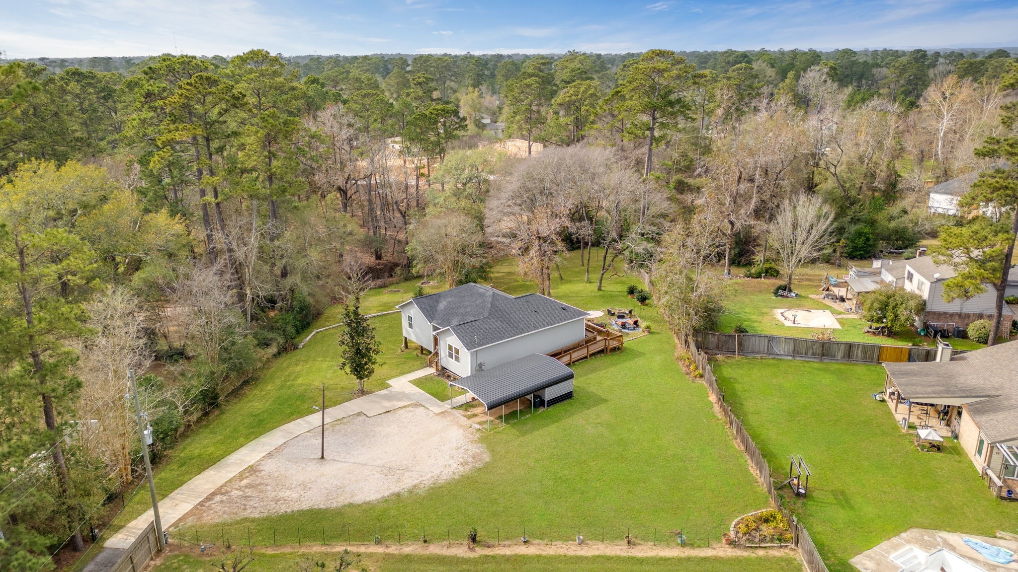 a view of a swimming pool with a yard