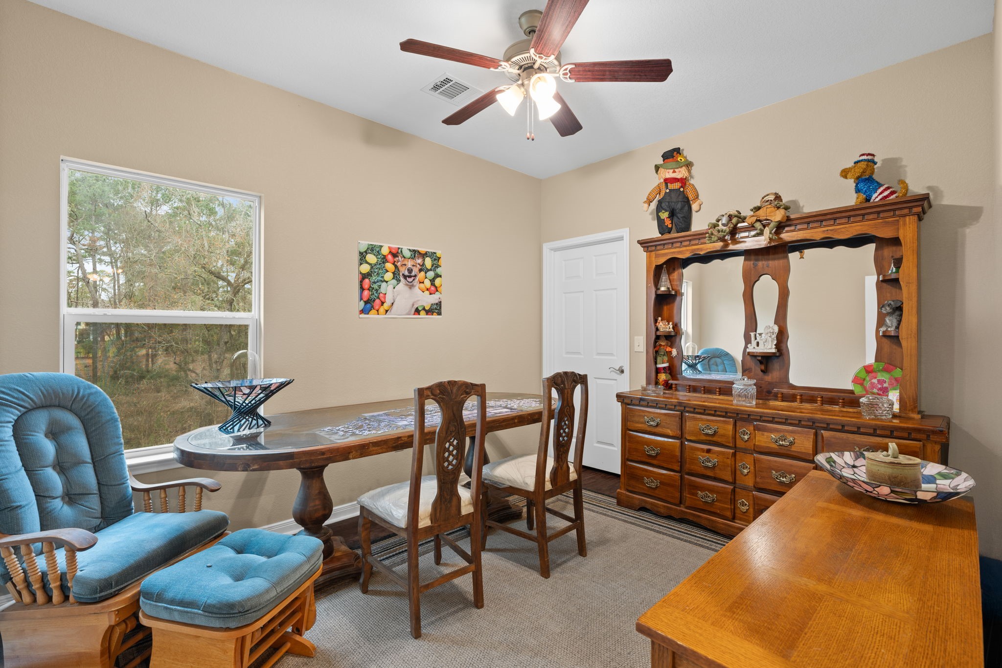 11706 Bogs Court Tomball, TX 77375 - Photo 21 of 42 a view of a livingroom with furniture and a table