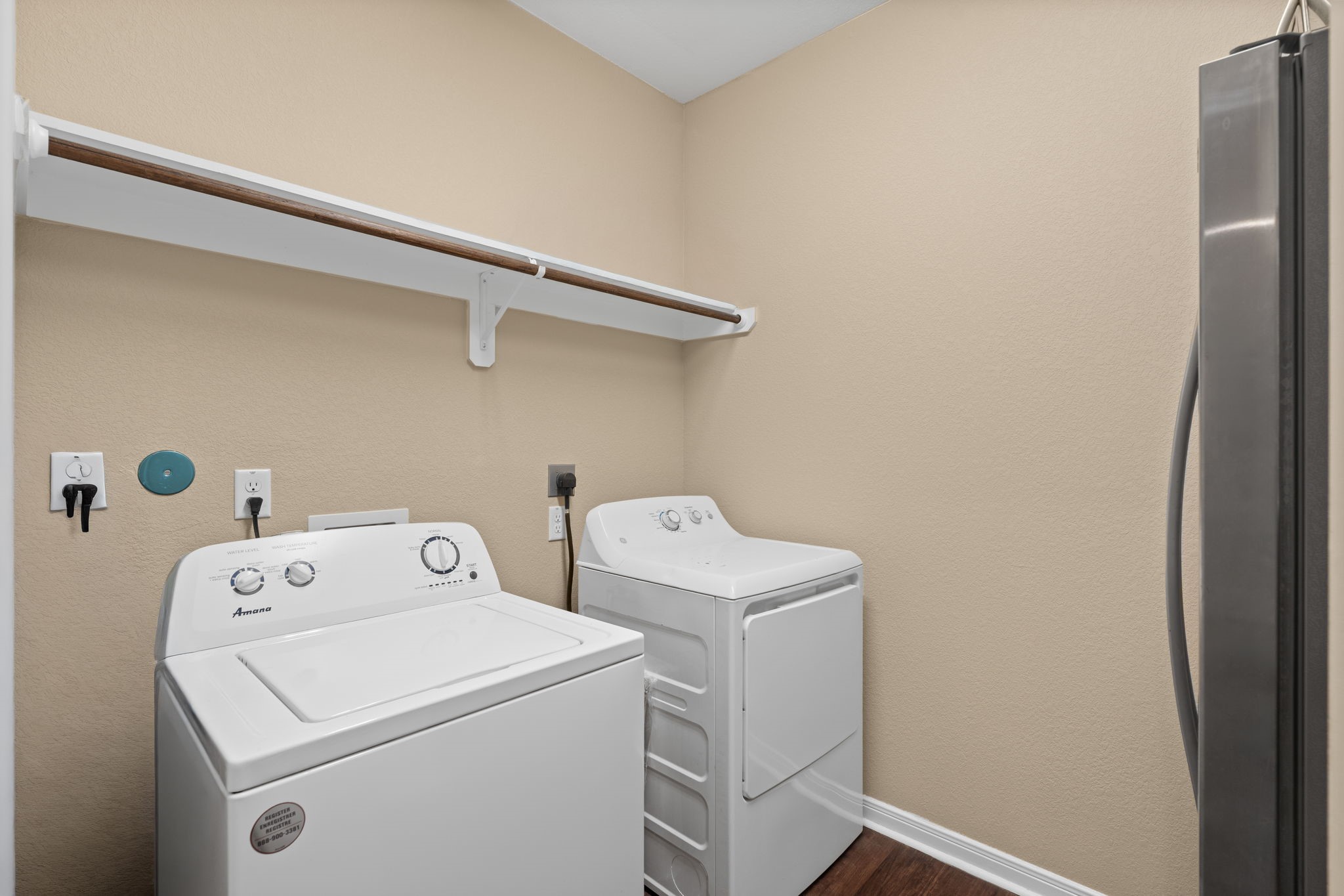 11706 Bogs Court Tomball, TX 77375 - Photo 23 of 42 a view of storage and utility room with washer and dryer