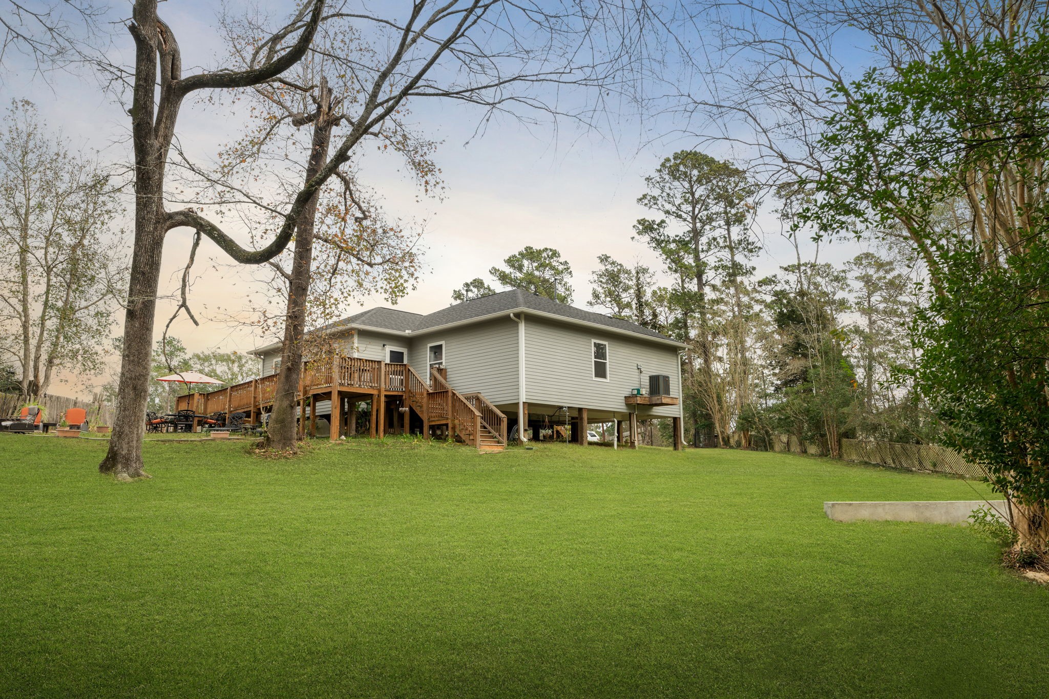 11706 Bogs Court Tomball, TX 77375 - Photo 24 of 42 a view of a house with a yard