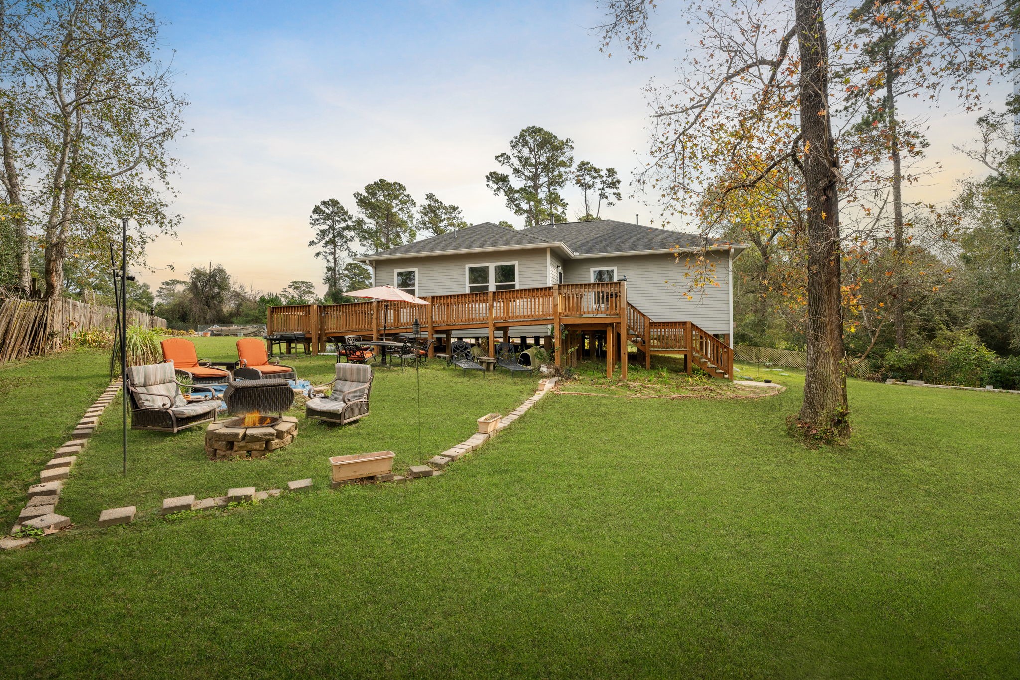 11706 Bogs Court Tomball, TX 77375 - Photo 32 of 42 a view of a house with a yard porch and sitting area