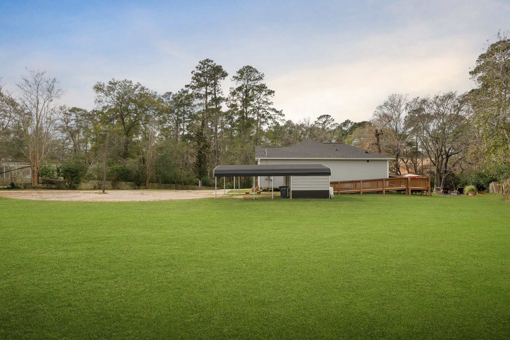 11706 Bogs Court Tomball, TX 77375 - Photo 37 of 42 a view of a house with a yard