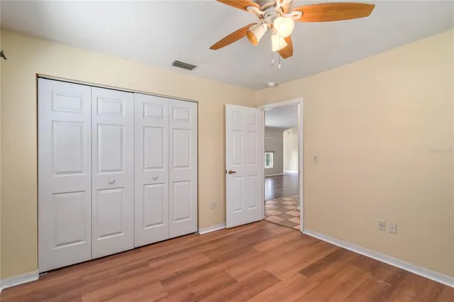 a bathroom with a toilet a sink and shower