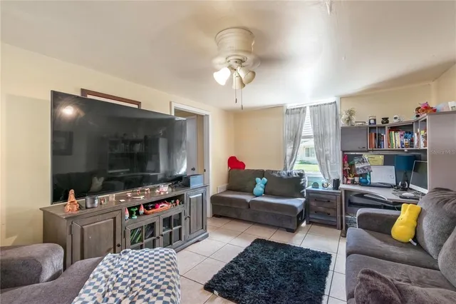 a kitchen with stainless steel appliances a stove a sink and a refrigerator