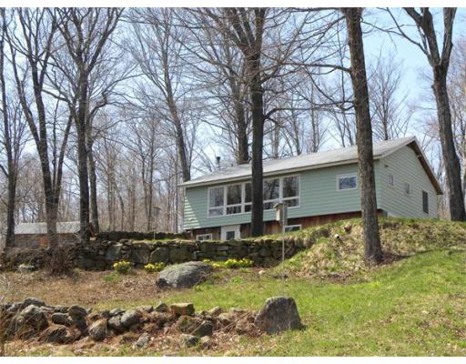 10 Willey Road Monroe, MA 01350 - Photo 1 of 18 a backyard of a house with lots of green space
