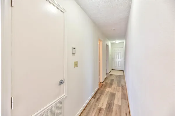 a bathroom with a sink toilet and mirror