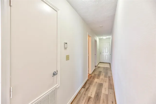 a bathroom with a sink toilet and mirror