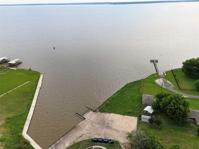 an aerial view of a house with a garden