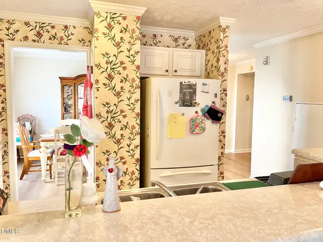 a bathroom with a sink and a shower