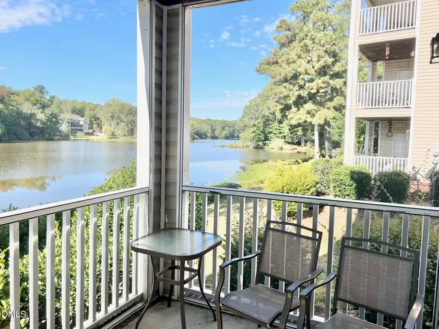 a view of a lake with a city view